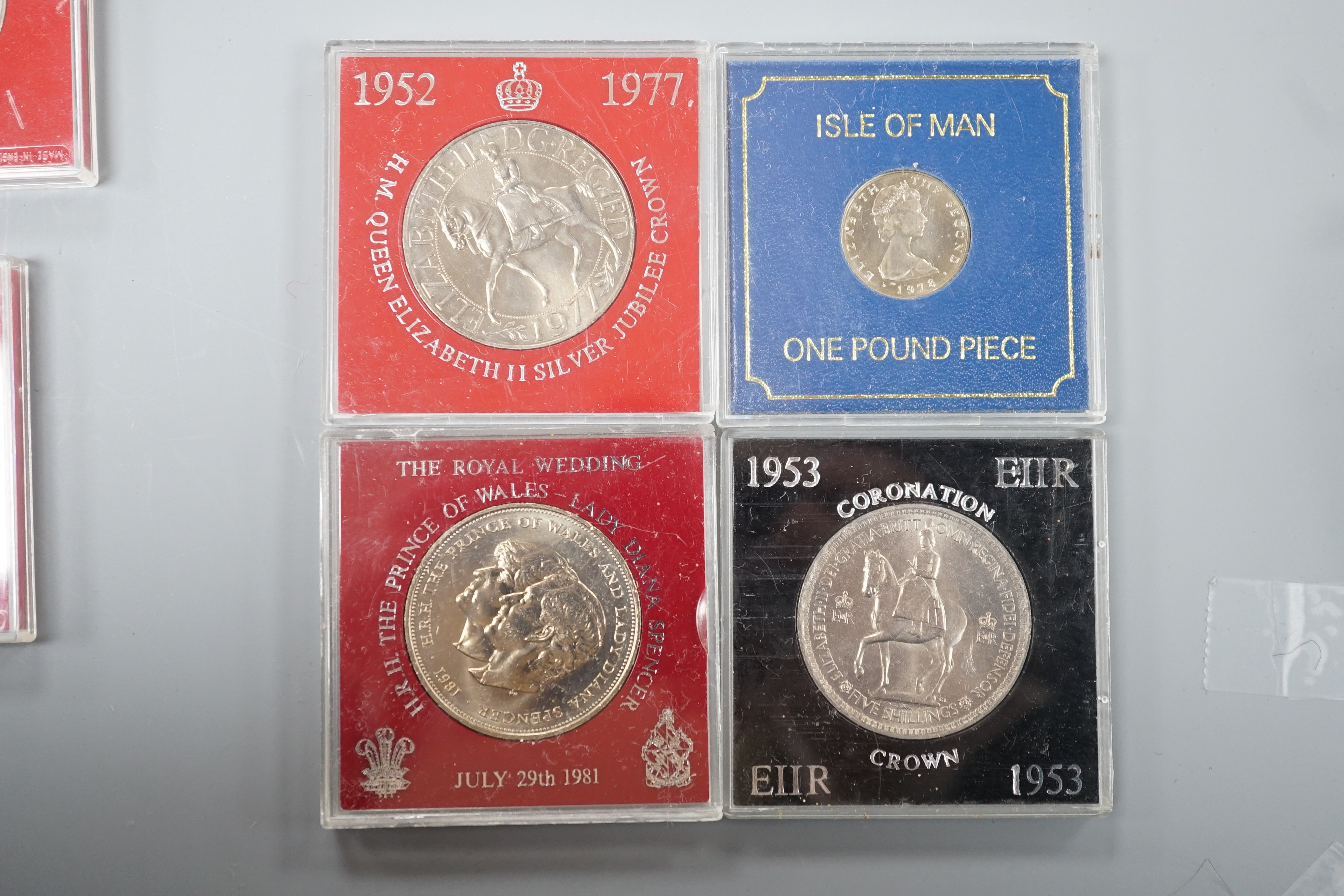A collection of coins including a Victoria crown and two florins